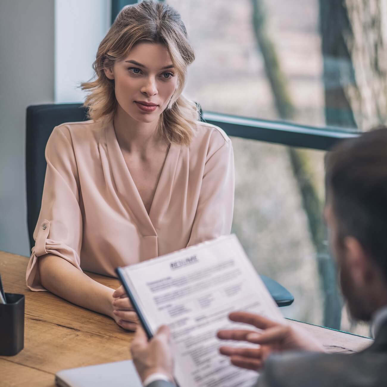 A woman consults a lawyer about her divorce in Minnesota.